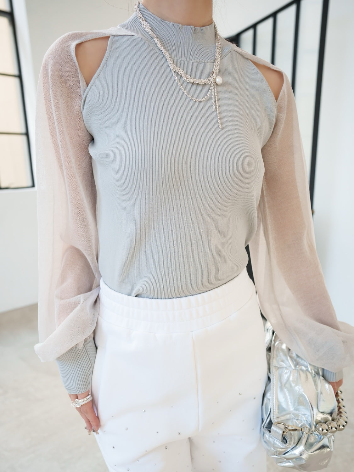 Sheer sleeve docking knit top