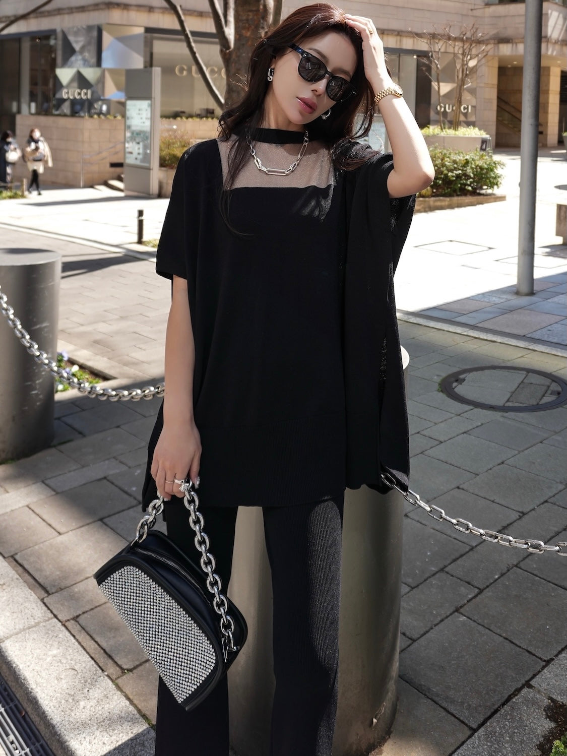 Poncho-like decollete sheer knit set