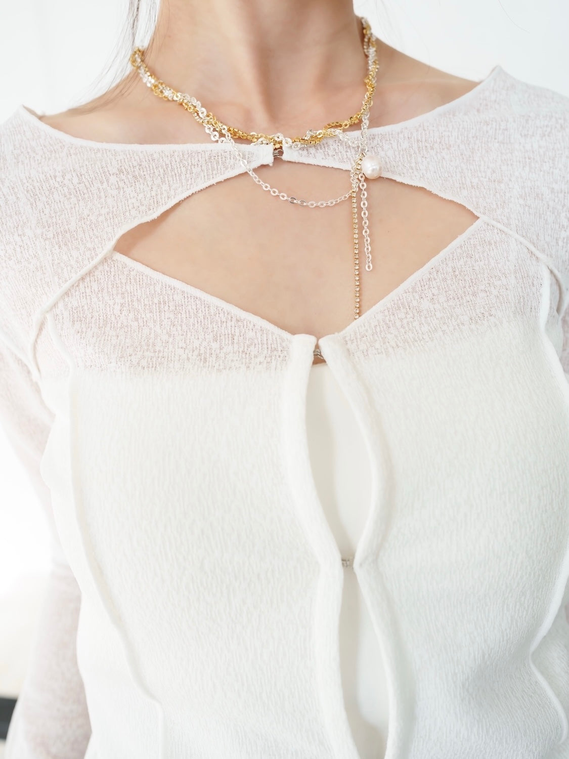Ensemble-like cardigan and top