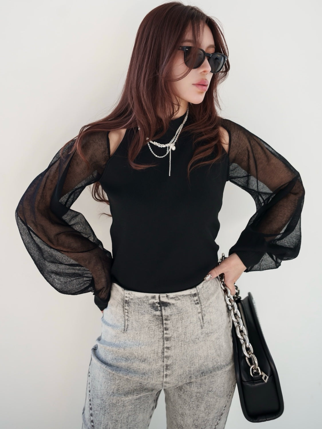 Sheer sleeve docking knit top