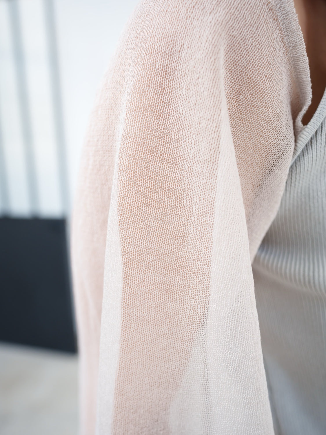 Sheer sleeve docking knit top
