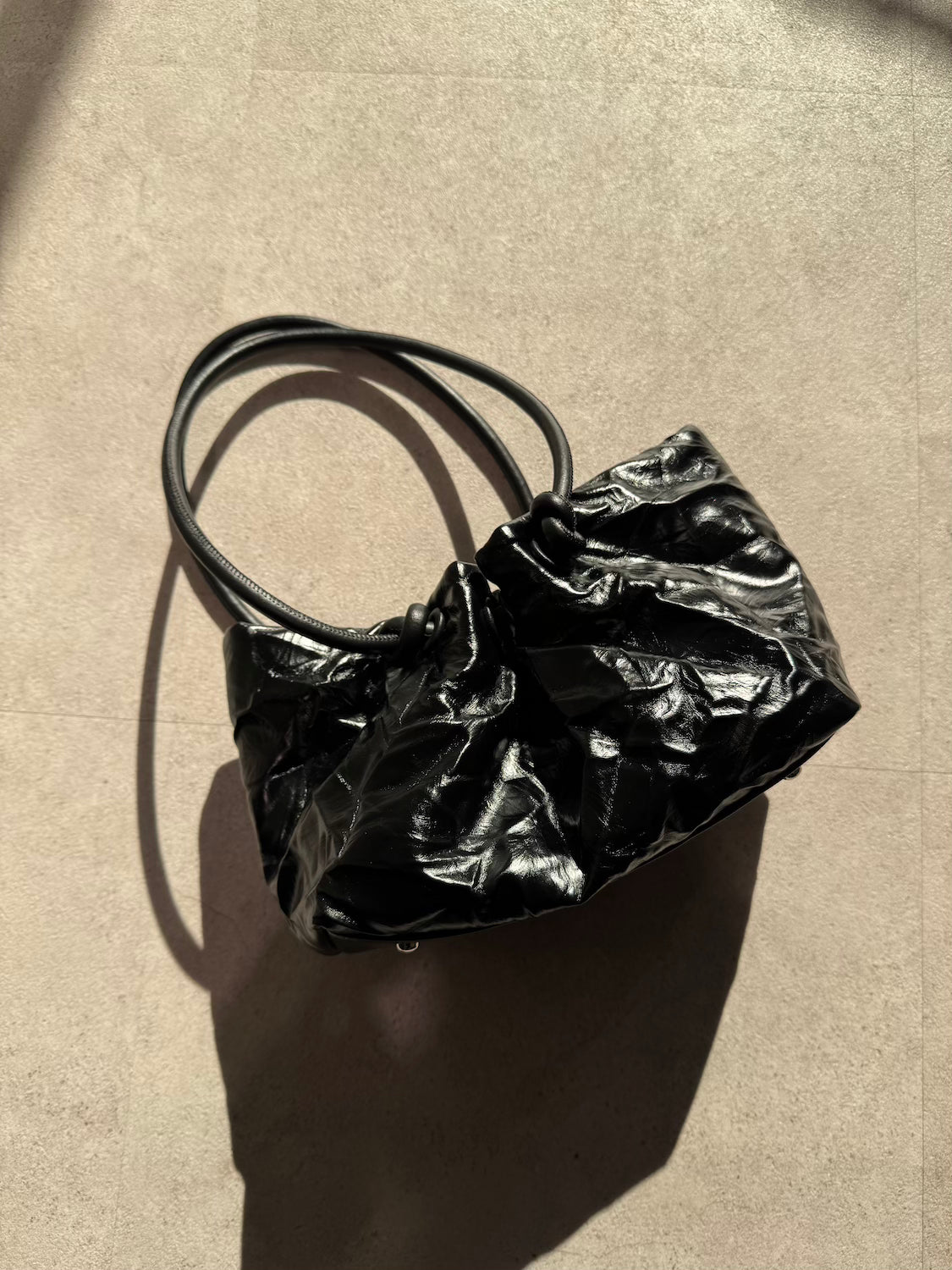 Knot crinkled leather tote