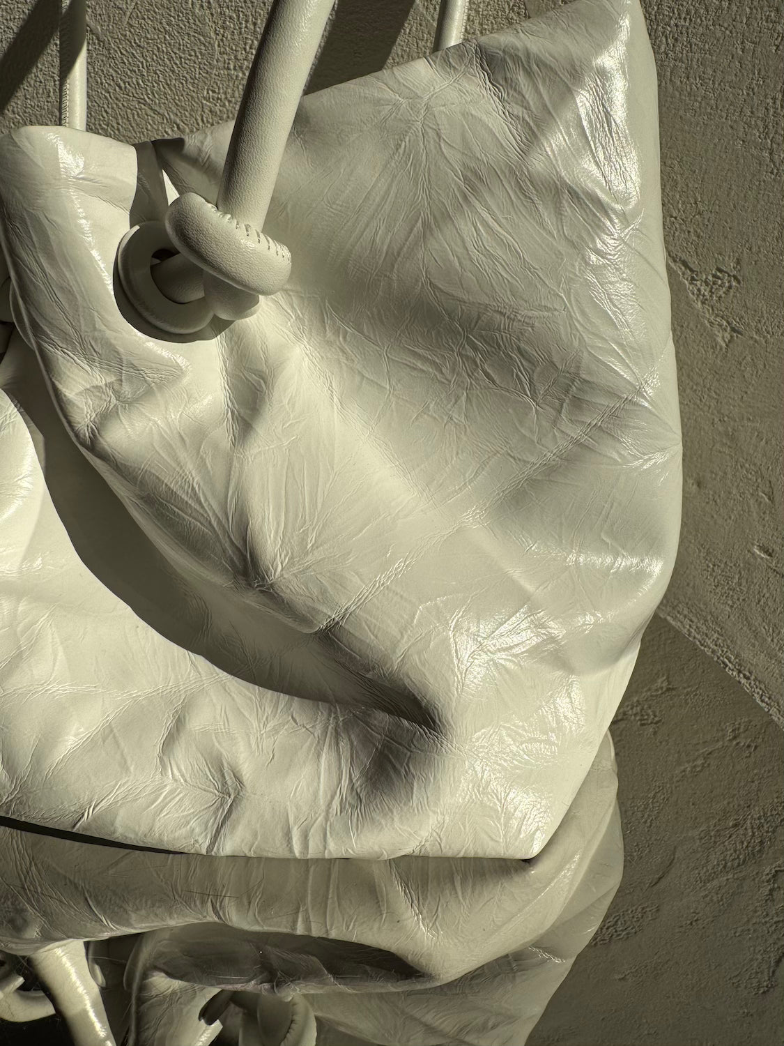 Knot crinkled leather tote