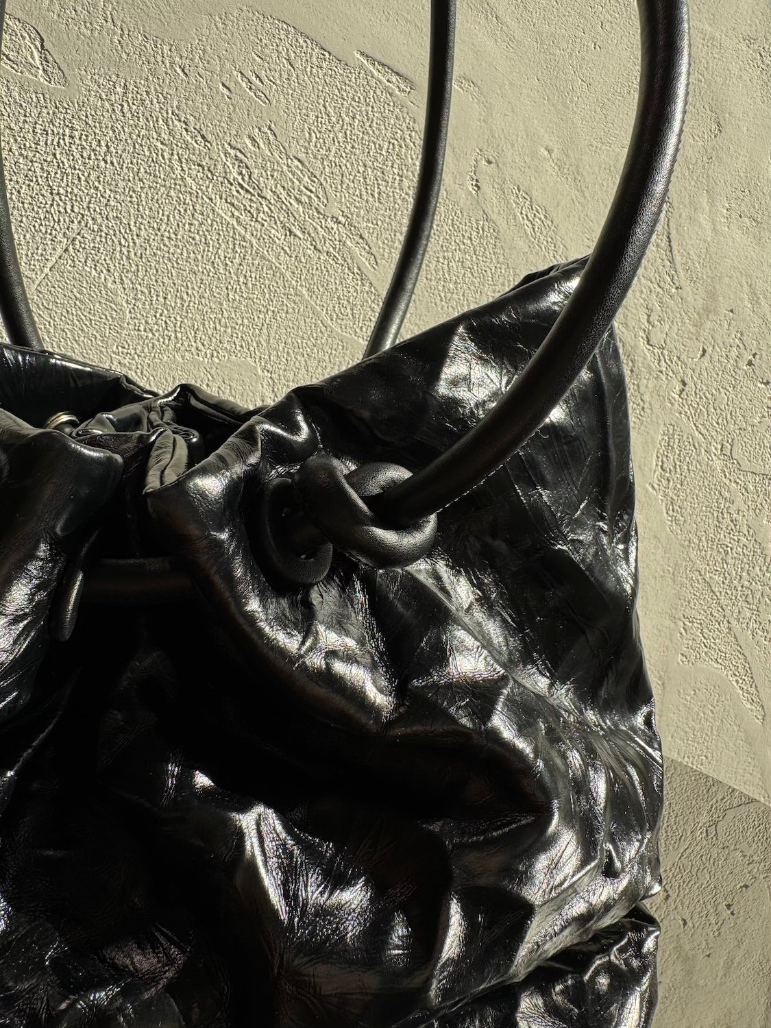 Knot crinkled leather tote