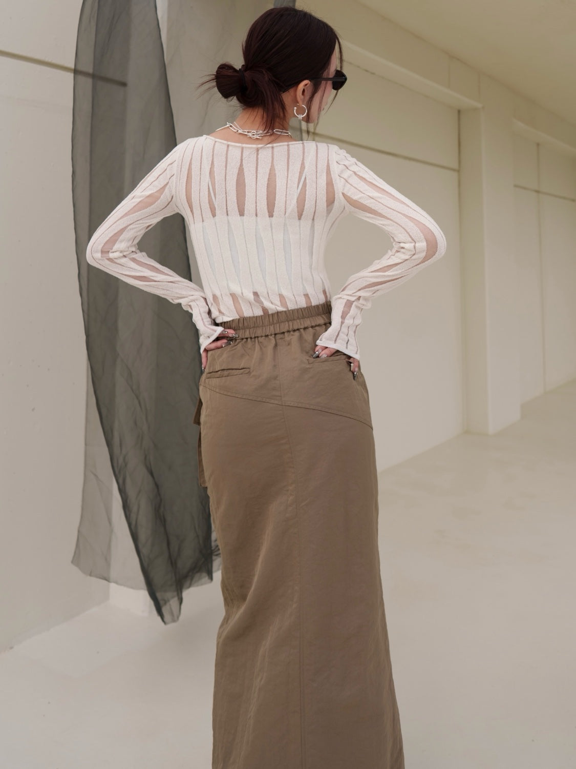 NUANCE ウェーブ シアーKNIT トップス